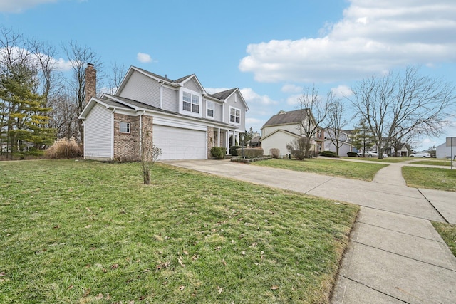 view of front of home with a garage and a front yard