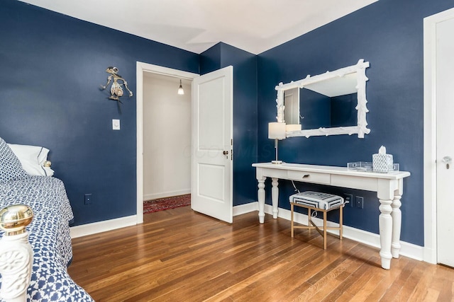 bedroom featuring hardwood / wood-style floors