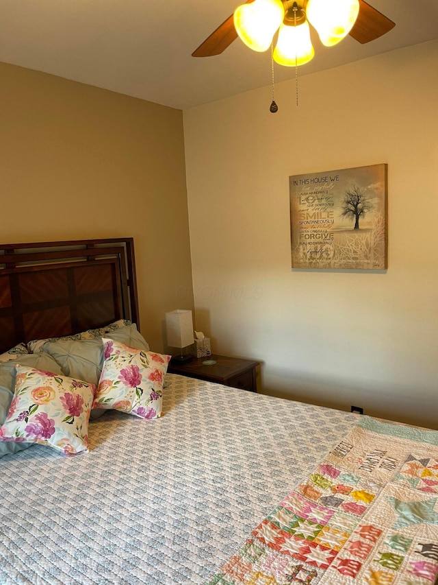 bedroom featuring ceiling fan