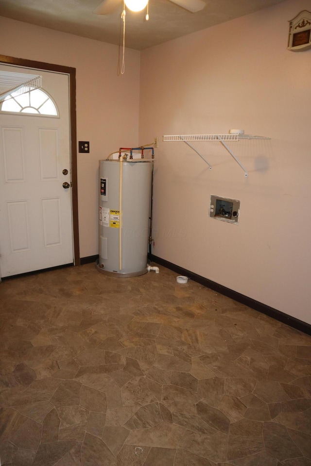 interior space featuring water heater, hookup for a washing machine, and ceiling fan