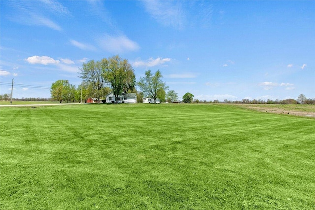exterior space with a rural view