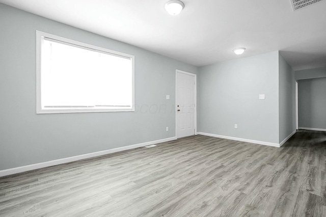 empty room with light wood-type flooring