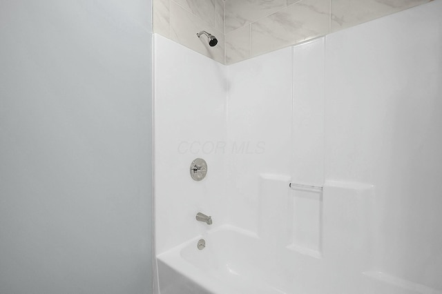 bathroom featuring washtub / shower combination