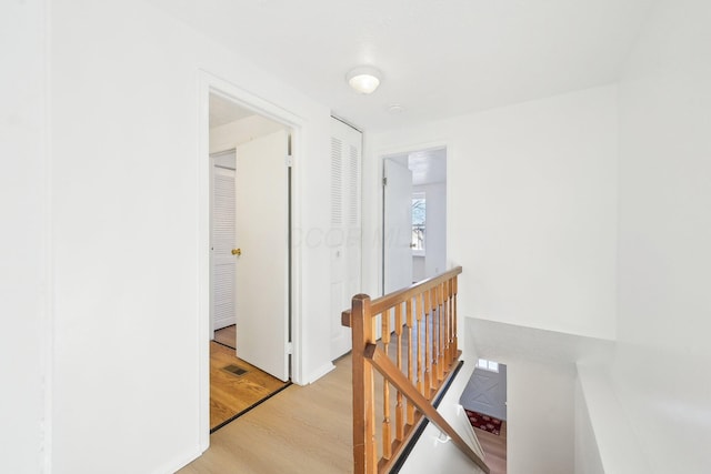 hall featuring light hardwood / wood-style flooring