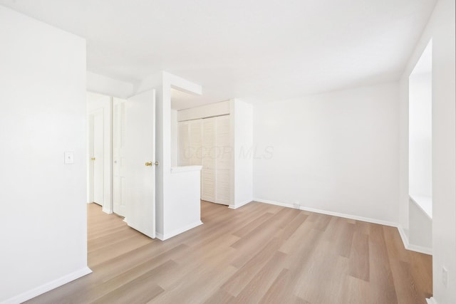 empty room featuring light wood-type flooring