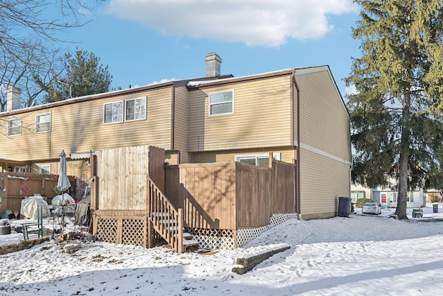 view of snow covered property