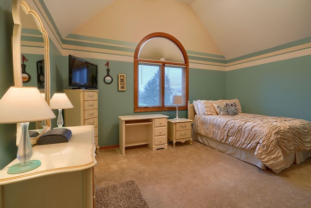 bedroom featuring lofted ceiling and light colored carpet