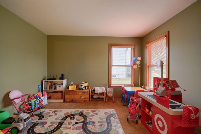 game room with light carpet