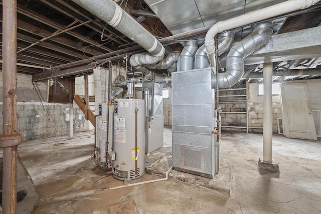 basement featuring gas water heater and heating unit