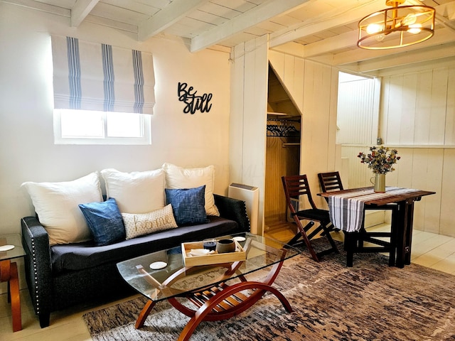 living room with beamed ceiling and wooden ceiling