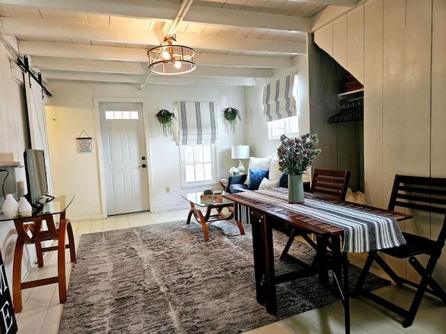 dining room featuring wood ceiling and beam ceiling