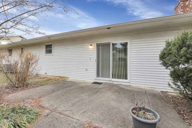 back of property featuring a patio area