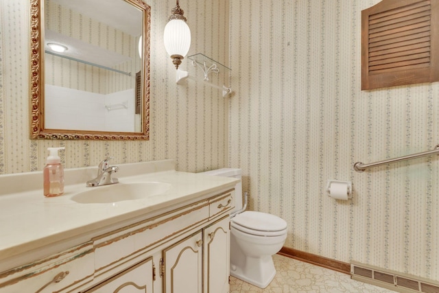 bathroom with vanity and toilet