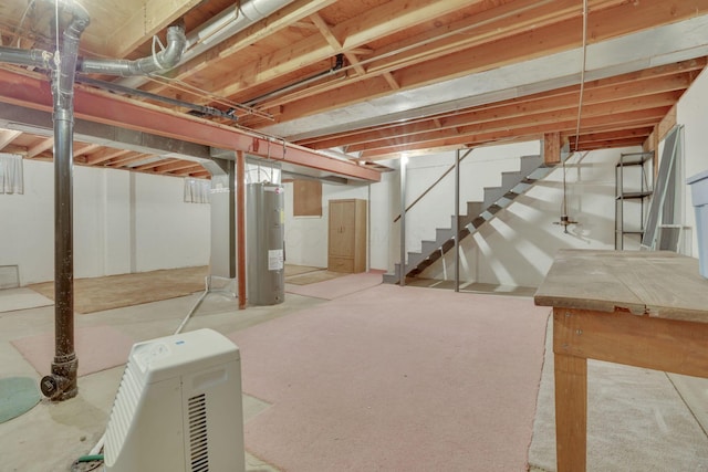 basement featuring electric water heater