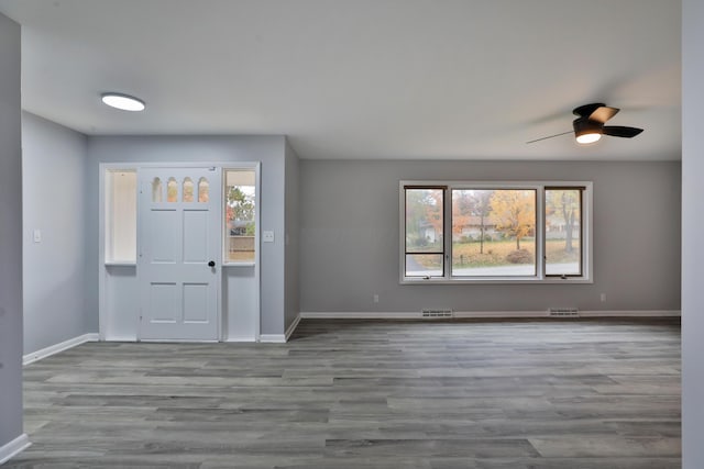 entrance foyer featuring ceiling fan and light hardwood / wood-style flooring