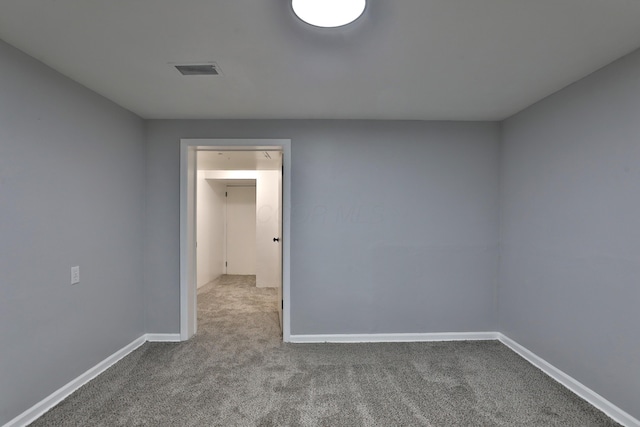 unfurnished room with carpet floors