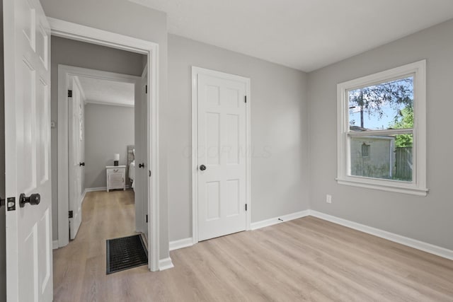 unfurnished bedroom with light hardwood / wood-style flooring