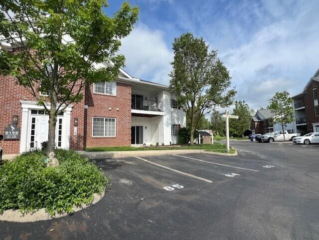 6155 Pelican Pointe Unit 103, Columbus, OH 43231 - view of property with uncovered parking