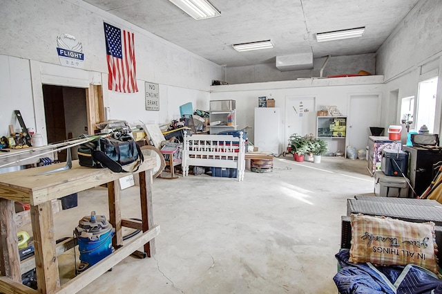 garage with white fridge