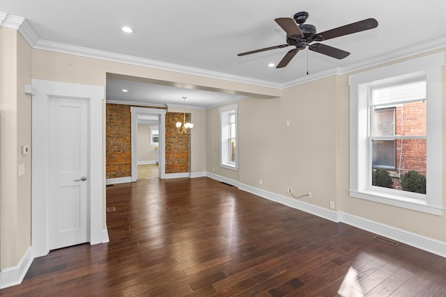 spare room with crown molding, ceiling fan with notable chandelier, and dark hardwood / wood-style flooring