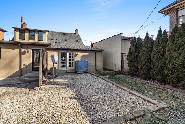 back of house with a patio area