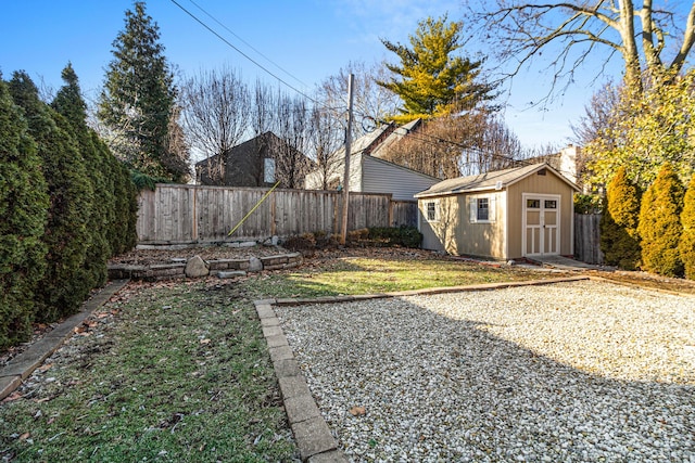 view of yard with a storage shed