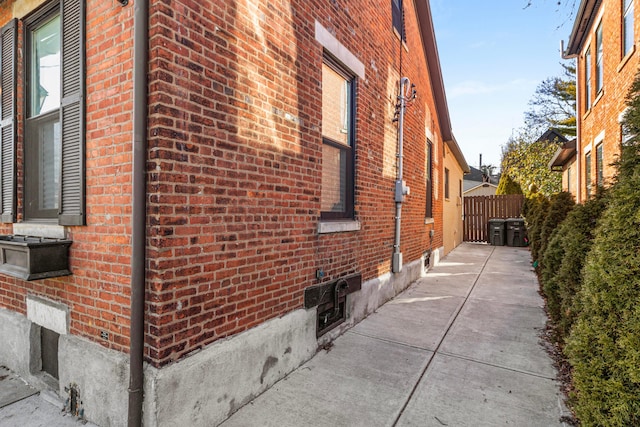 view of side of property with a patio