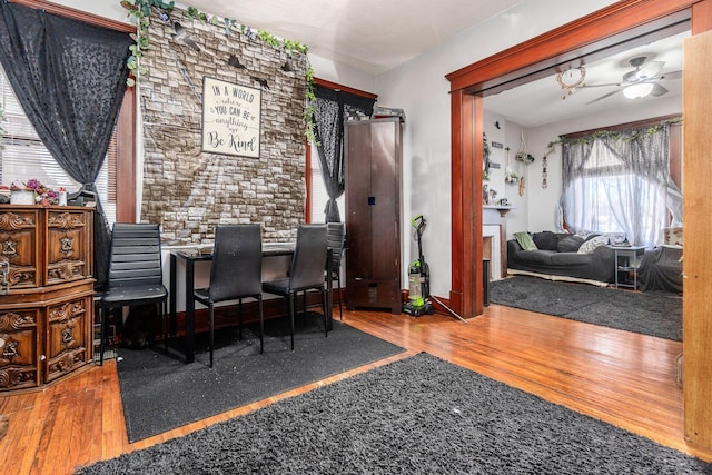 dining room featuring hardwood / wood-style flooring and ceiling fan