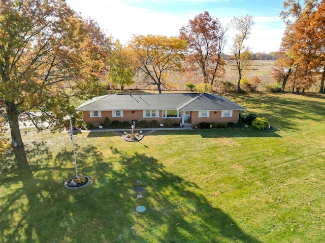 view of front of home with a front yard