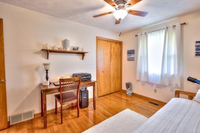 office area with ceiling fan and light wood-type flooring