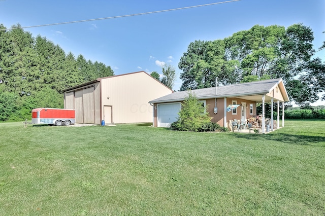 back of house featuring a lawn