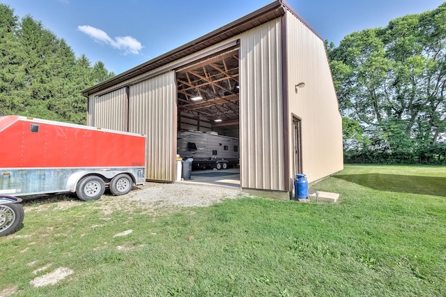 view of outdoor structure with a yard