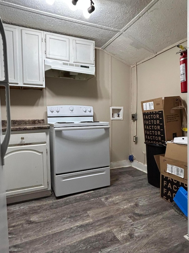 kitchen featuring vaulted ceiling, white electric range, white cabinetry, stainless steel fridge, and dark hardwood / wood-style flooring