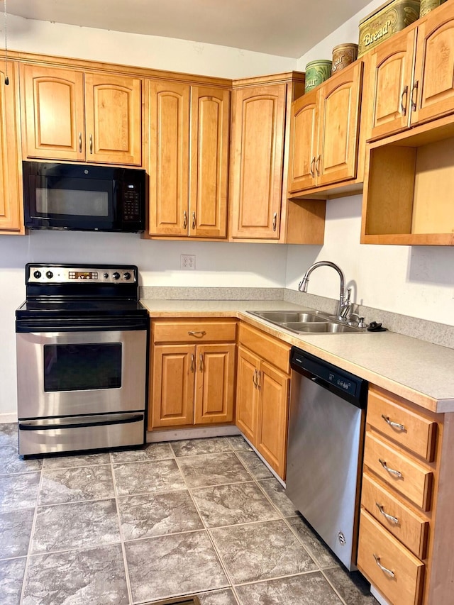 kitchen featuring stainless steel appliances and sink