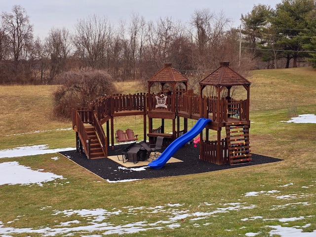 view of jungle gym with a lawn