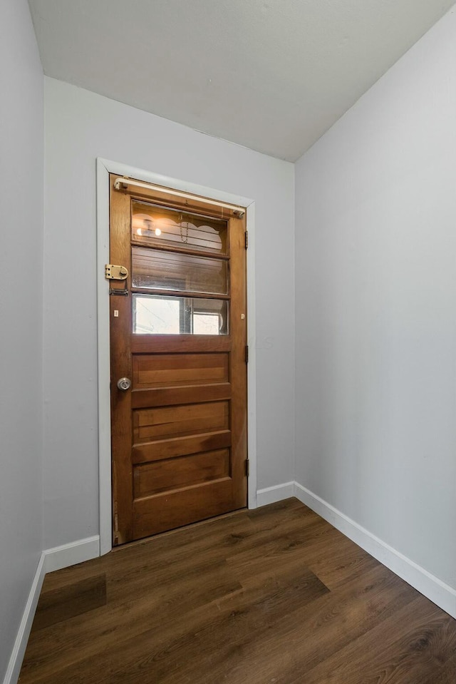 doorway to outside featuring dark hardwood / wood-style floors