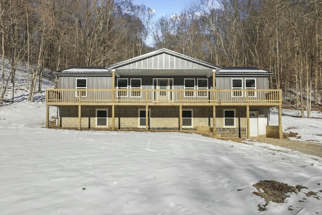 view of front facade with a wooden deck