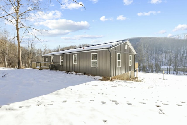 exterior space featuring a wooden deck