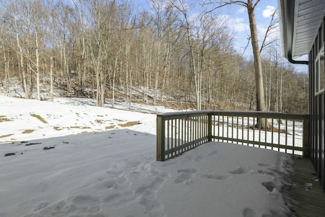 view of snow covered deck