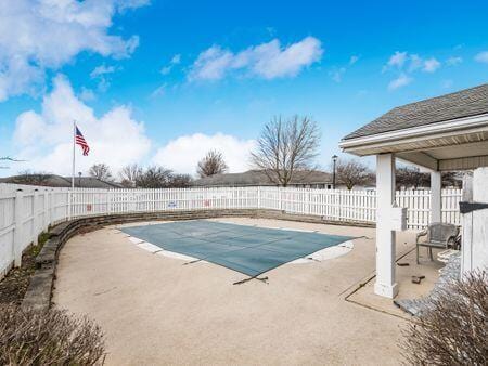 view of pool featuring a patio