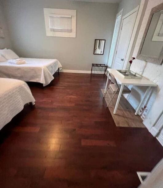 bedroom featuring dark hardwood / wood-style floors