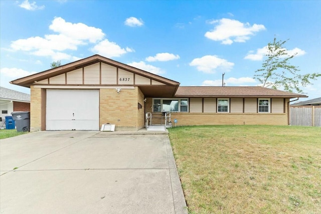 ranch-style house with a garage and a front lawn