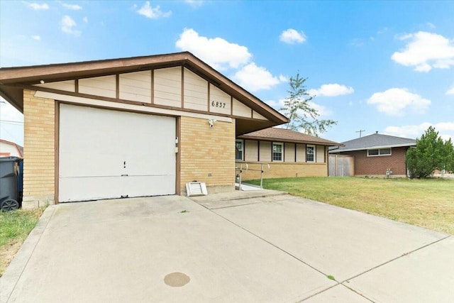 ranch-style home featuring a front yard