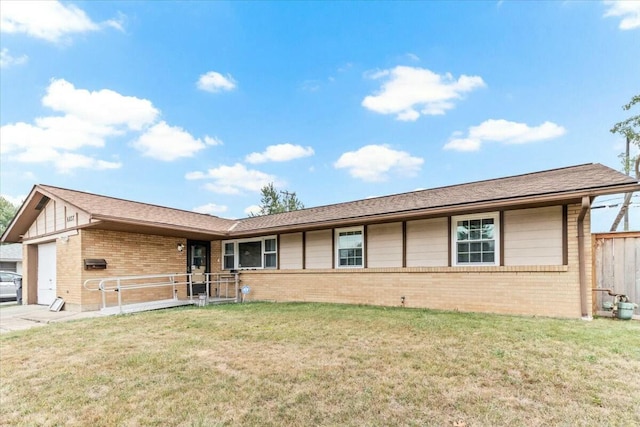 ranch-style home with a garage and a front lawn