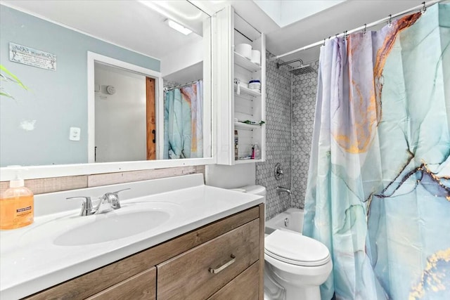 full bathroom with shower / bathtub combination with curtain, vanity, and toilet