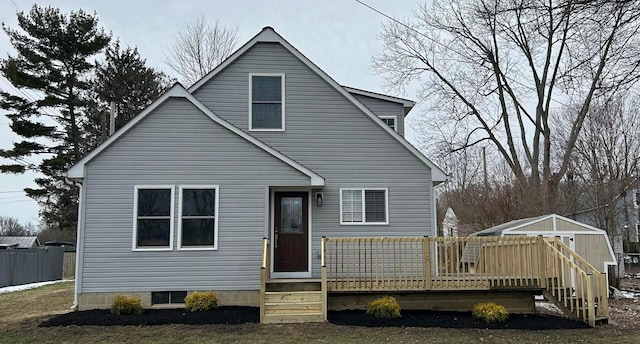 view of front of home featuring a wooden deck