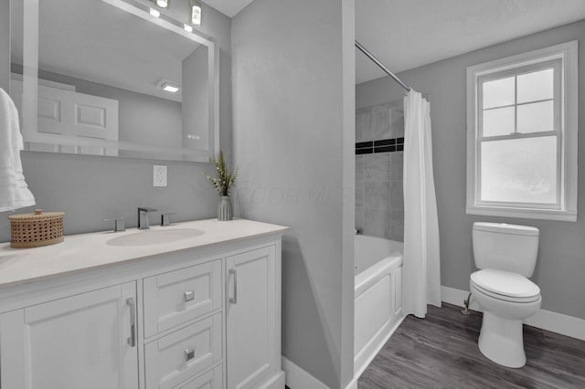 full bathroom with shower / tub combo with curtain, vanity, toilet, and wood-type flooring