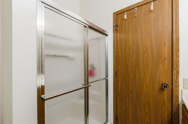 bathroom with an enclosed shower