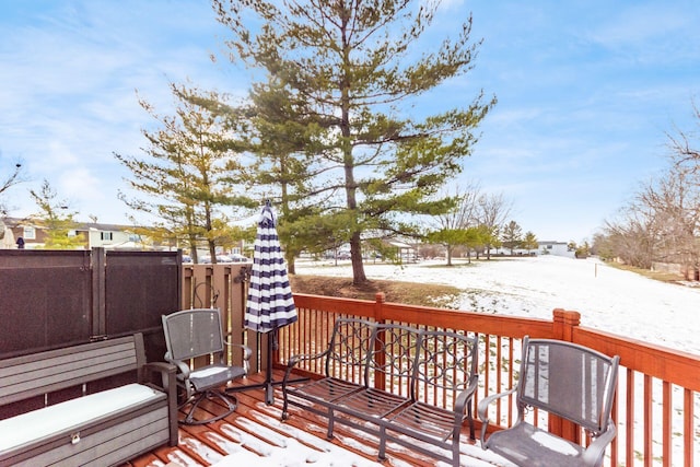 view of snow covered deck