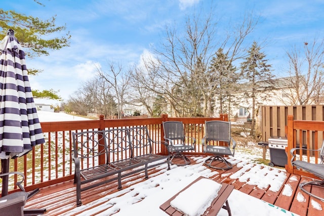 view of snow covered deck